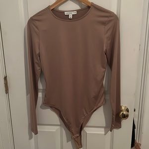 Champagne/ nude long sleeve bodysuit